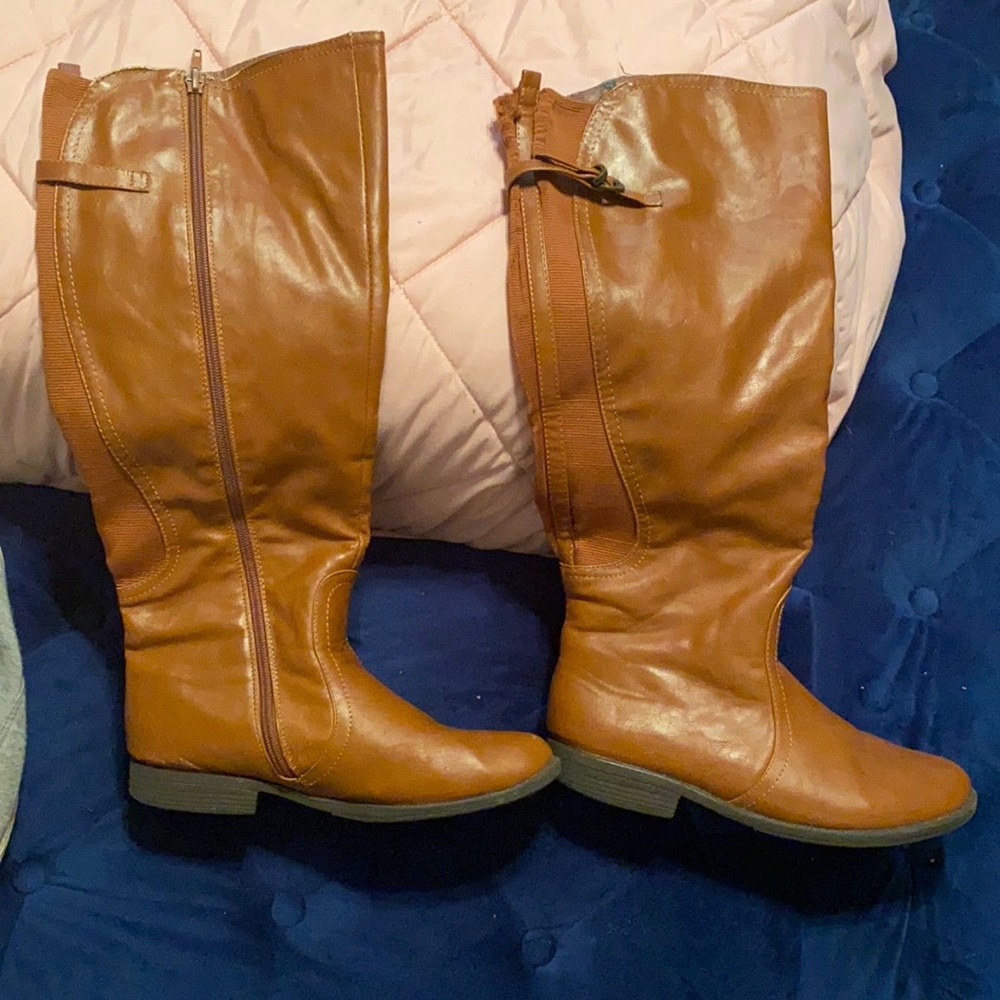 Brown leather knee high boots with slight heel